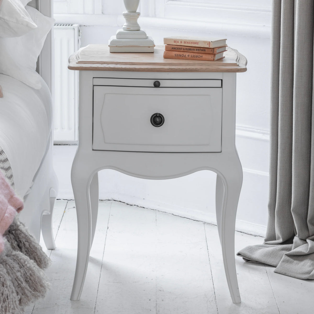 Amelie White Wooden 1-Drawer Bedside Table – front view in room setting