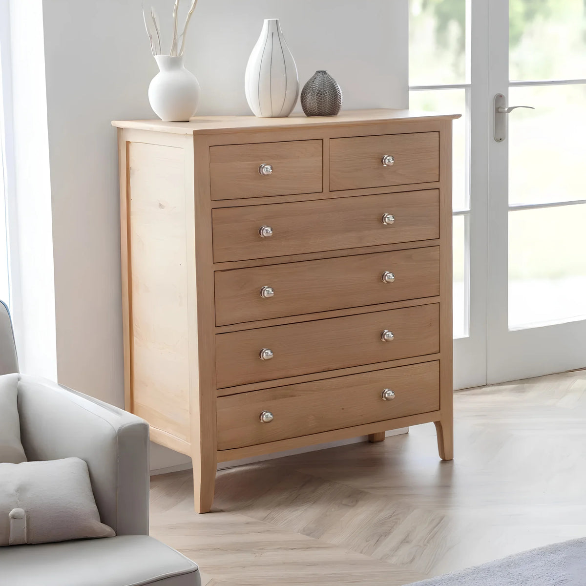 Cotswold Oak 6-Drawer Chest – angled front and side view in room setting
