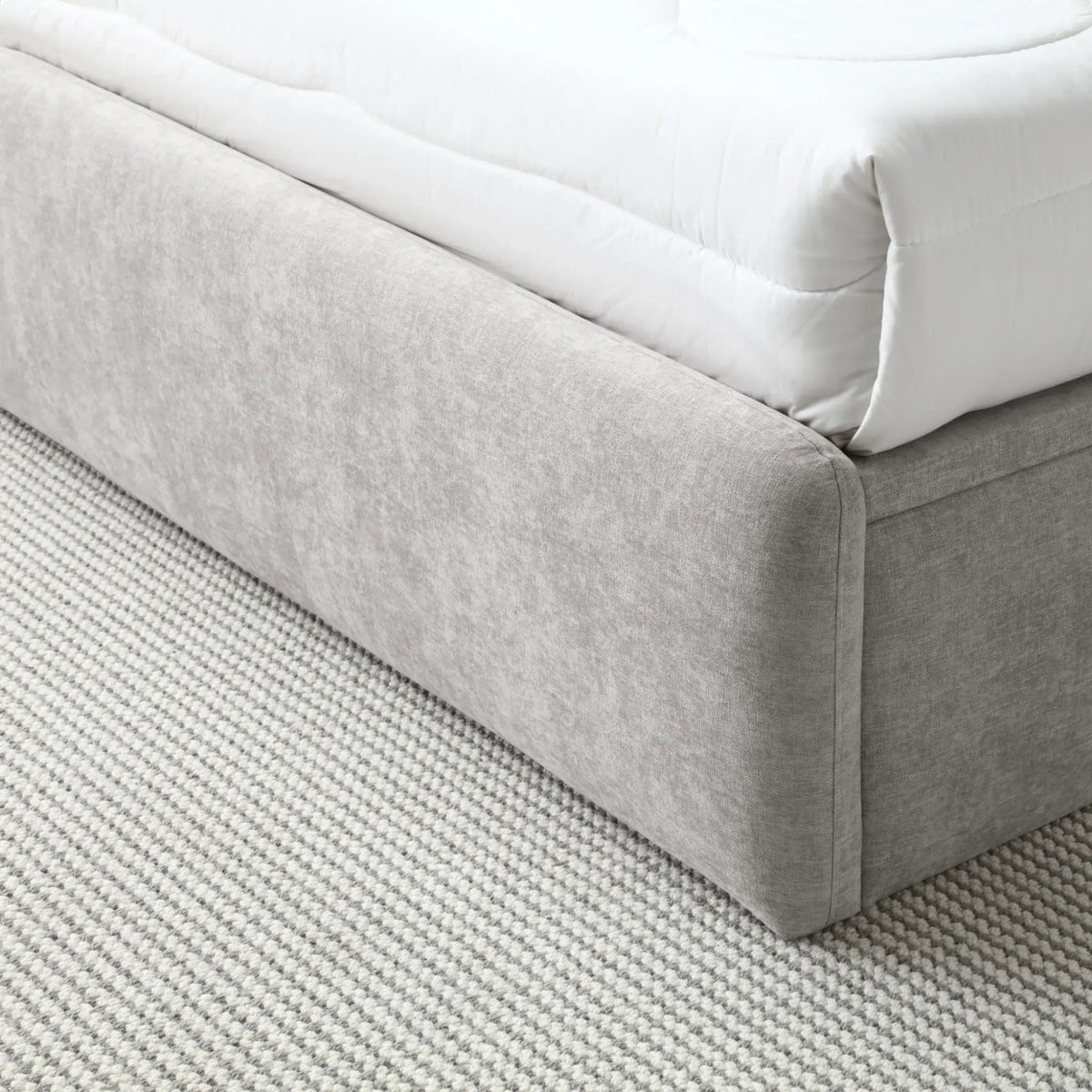 Asher Grey Chenille Ottoman Bed – close-up of upholstered base corner
