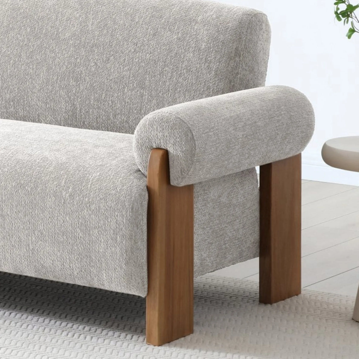Mila Oatmeal Chenille Sofa Bed – close-up of armrest and wooden leg detail