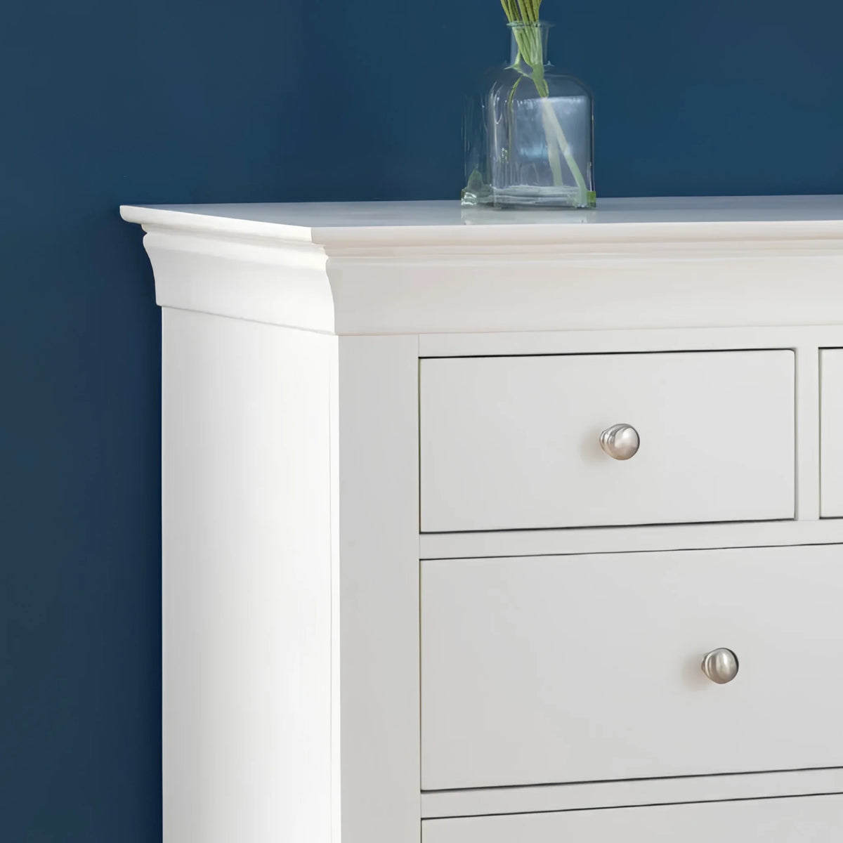 Clermont White Wooden 7-Drawer Chest – top corner close-up showing cornice detail