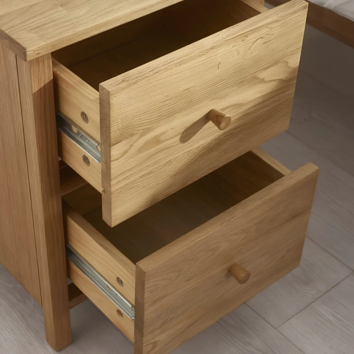 Coxmoor Oak 2-Drawer Bedside Chest – open drawer view