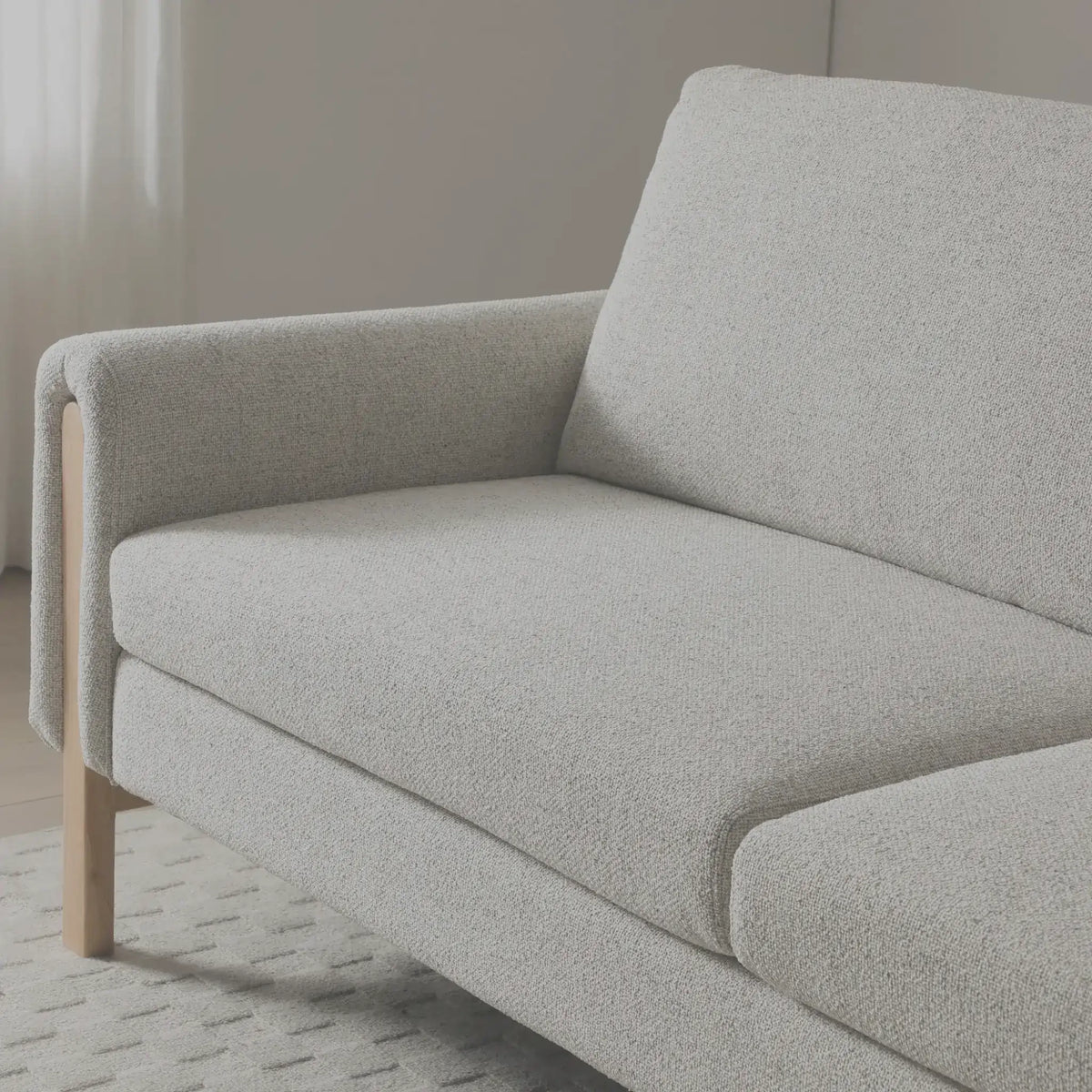 Thea Oatmeal Upholstered Wood Sofa Bed – close-up of textured upholstery