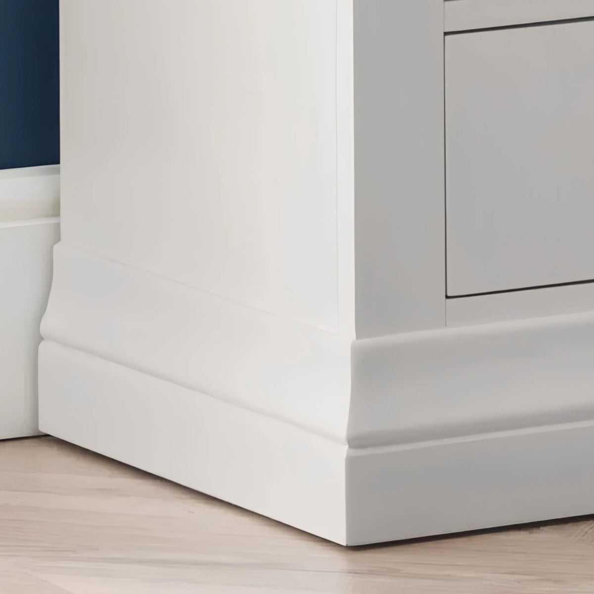 Clermont Grey Wooden 2-Drawer Bedside Chest – bottom corner close-up showing plinth base