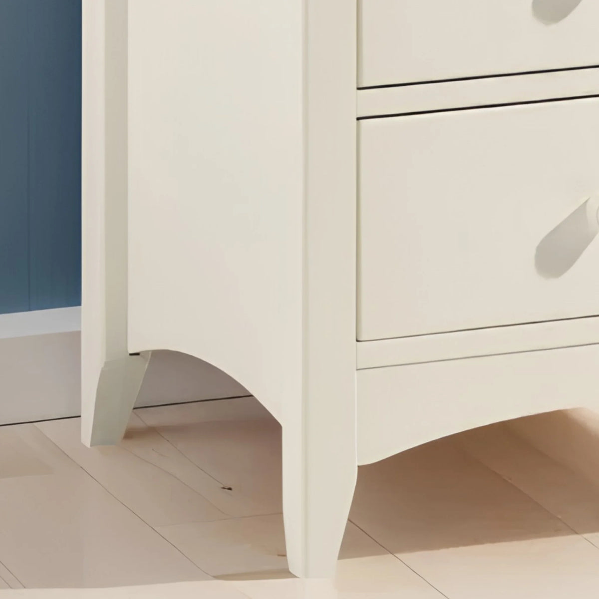 Cameo White 7-Drawer Tallboy – base and leg detail