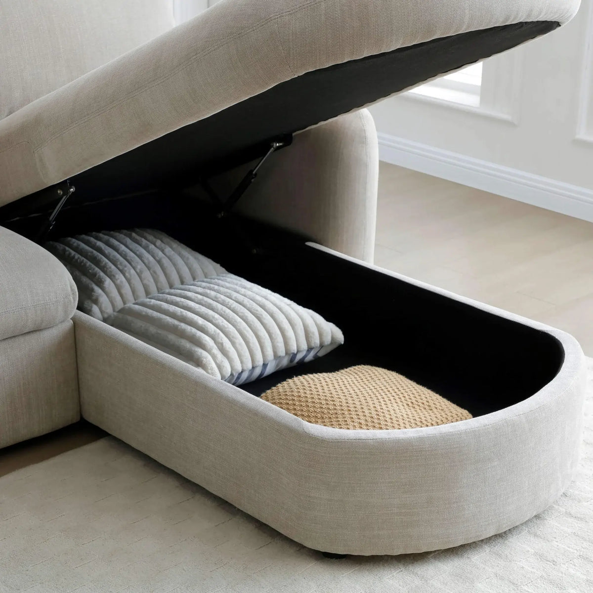 Mallory Taupe Corner Sofa Bed – view showing convenient integrated storage compartment