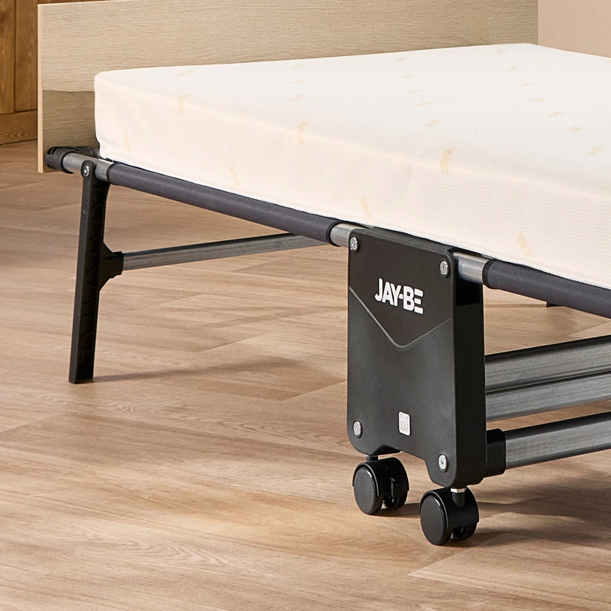 Tourist Folding Bed with Essential Mattress – close-up of leg and caster detail