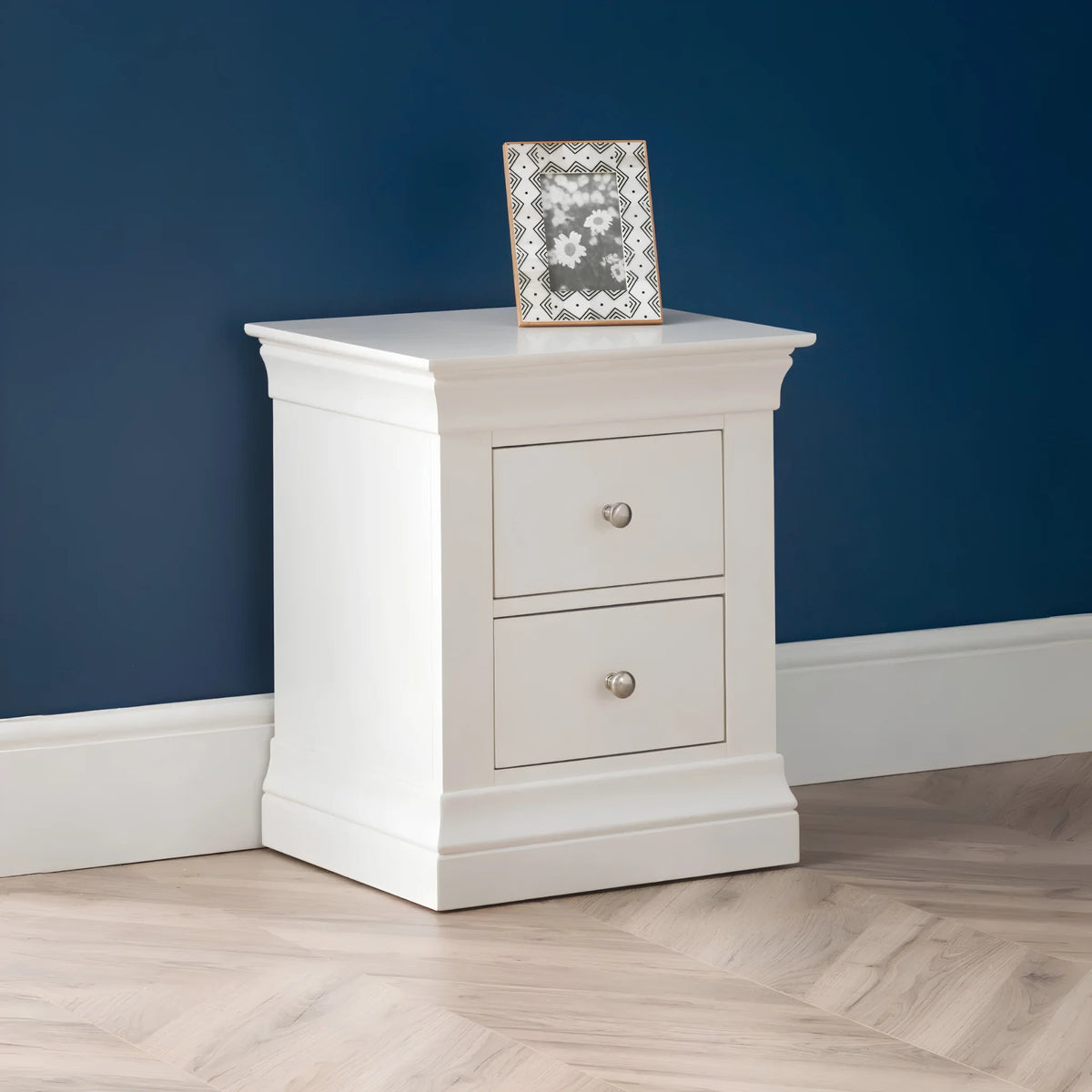 Clermont White Wooden 2-Drawer Bedside Chest – front view in room setting