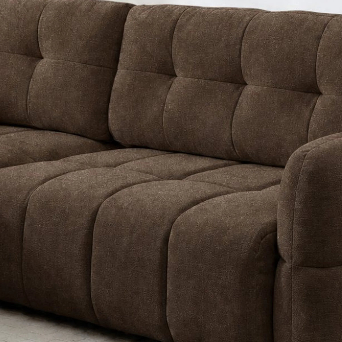 Morgan Brown Corner Sofa Bed – close-up of textured fabric and tufted cushion detail