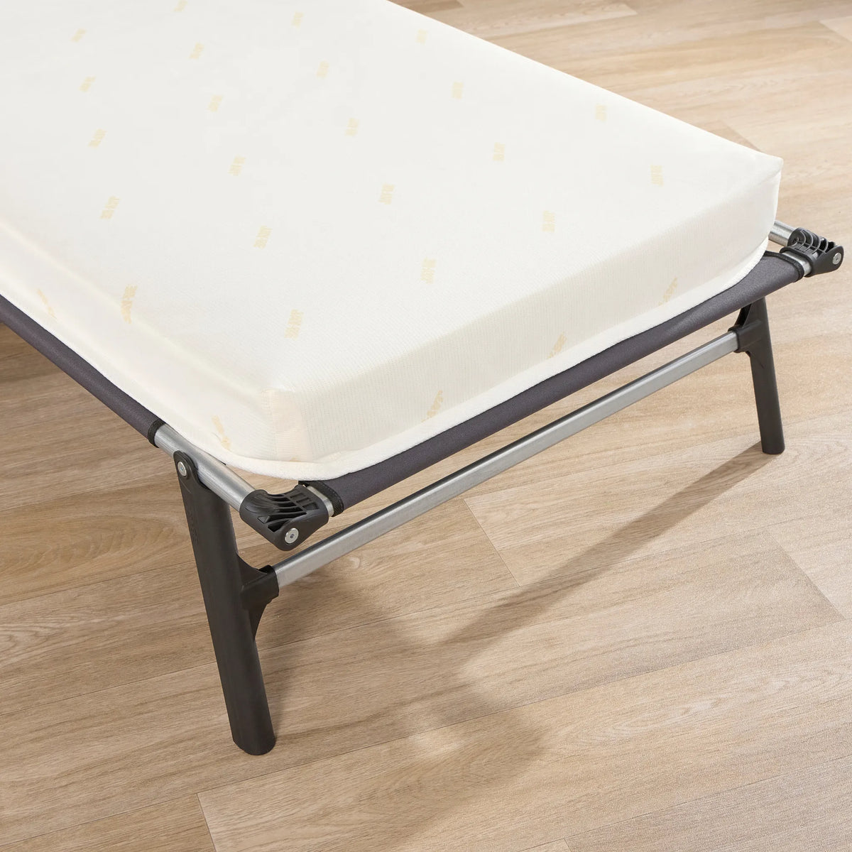 Tourist Folding Bed with Essential Mattress – close-up of corner hinge and mattress