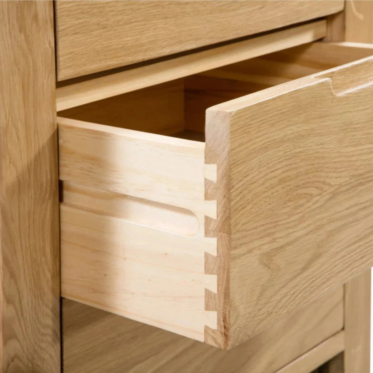Curve Oak 3-Drawer Bedside Chest – open drawer and dovetail joint close-up