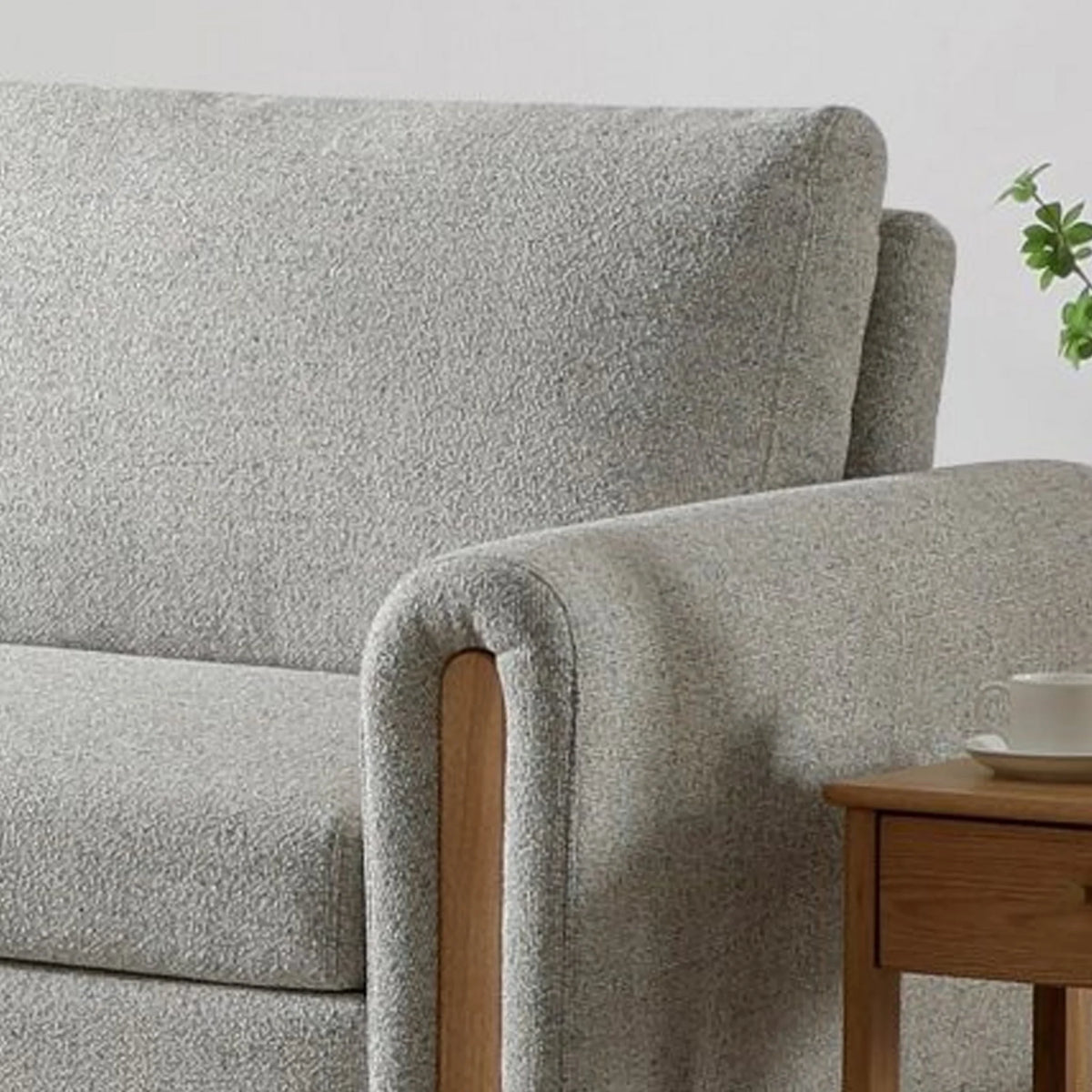 Thea Oatmeal Upholstered Wood Sofa Bed – close-up of textured upholstery