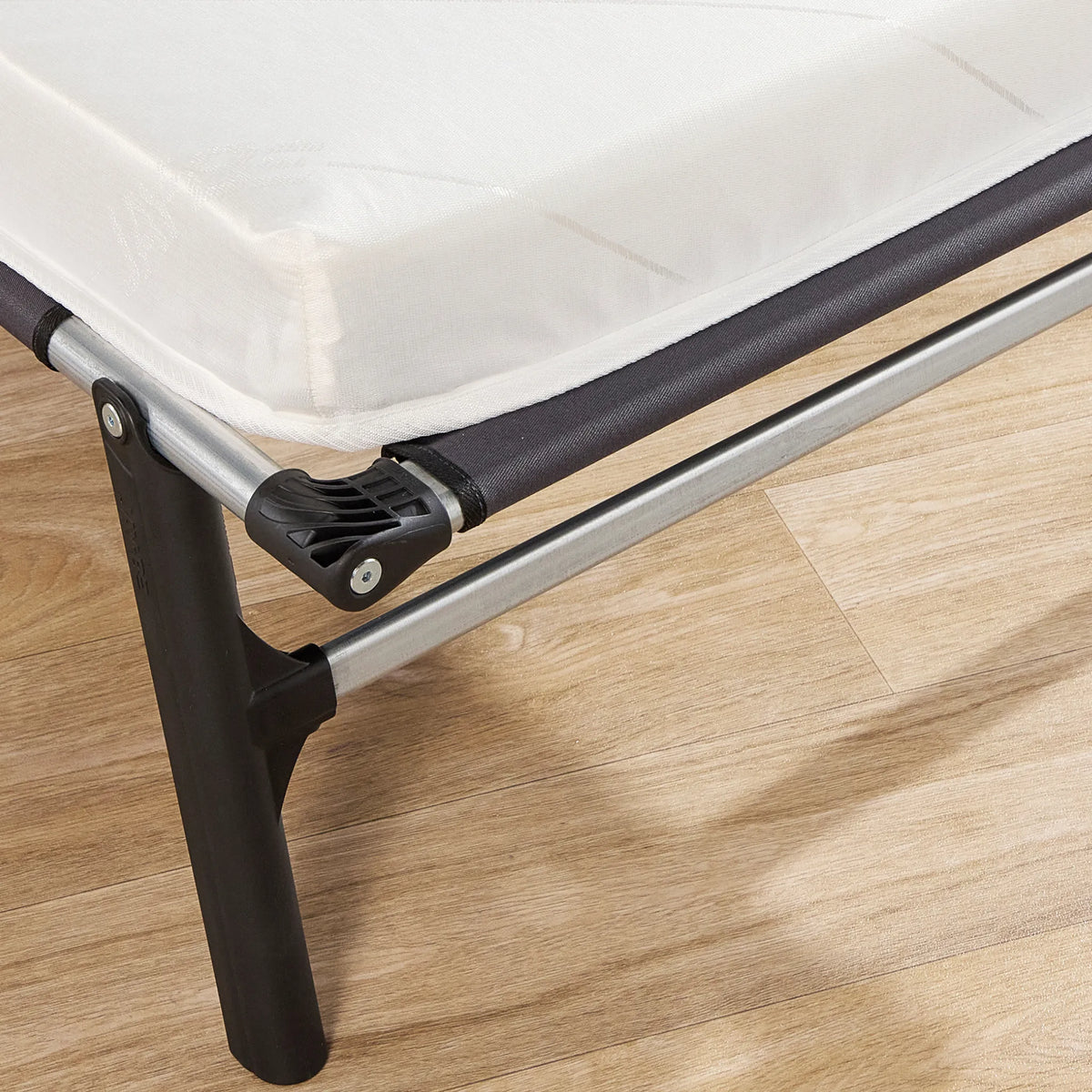 Rollaway Folding Bed with Comfort Mattress – close-up of corner hinge and mattress
