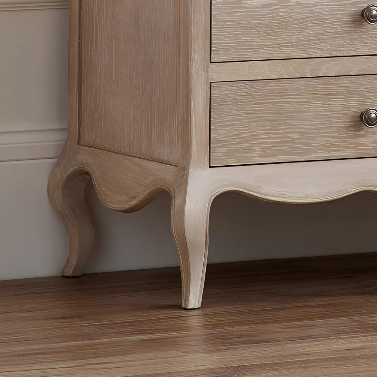 Camille Limed Oak 6-Drawer Wide Chest – leg detail close-up