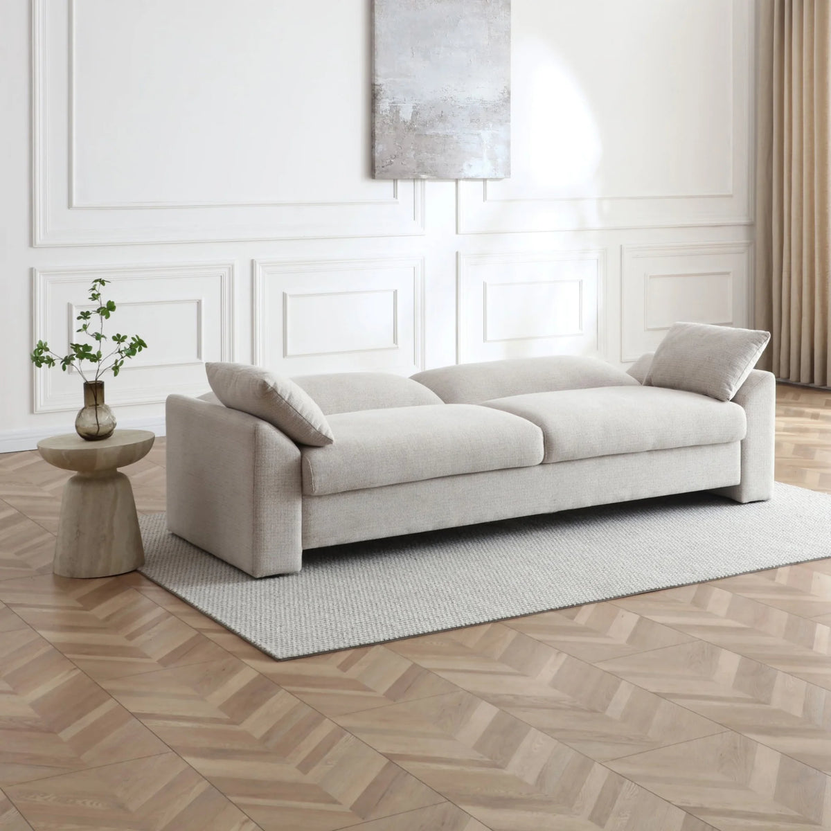 Evelyn Oatmeal Sofa Bed – angled view, elegant comfortable seating solution