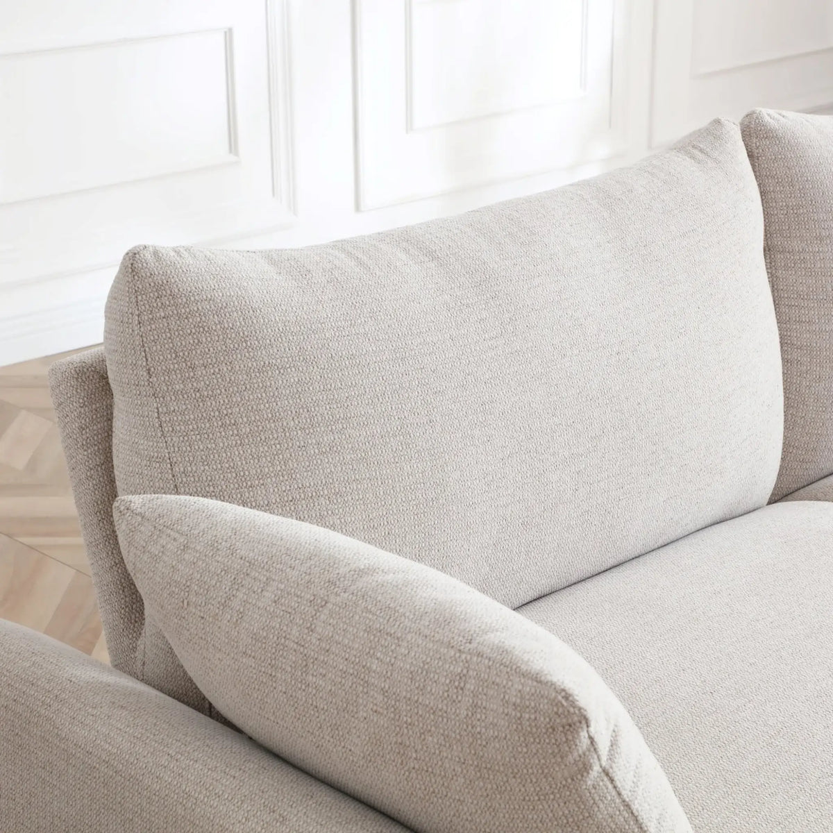 Evelyn Oatmeal Sofa Bed – close-up of textured fabric and armrest detail