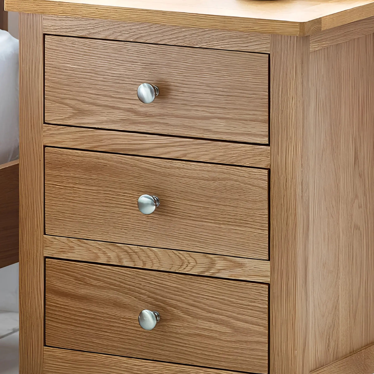 Mallory Oak 3-Drawer Bedside Chest – close-up of top drawers