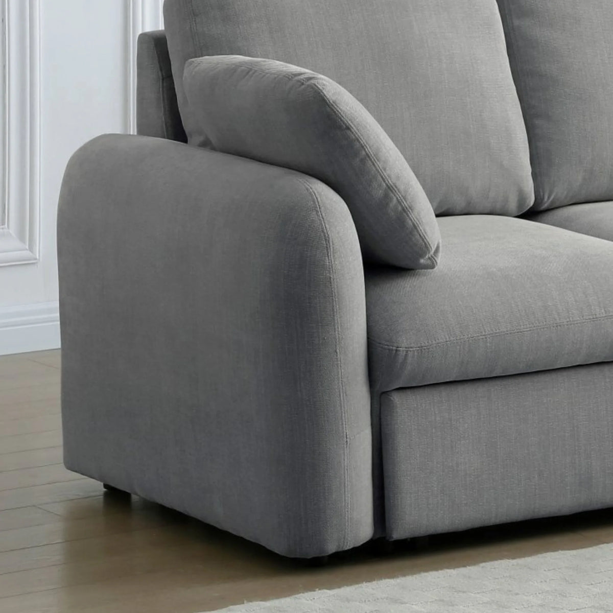 Mallory Grey Corner Sofa Bed – close-up of textured fabric and armrest detail