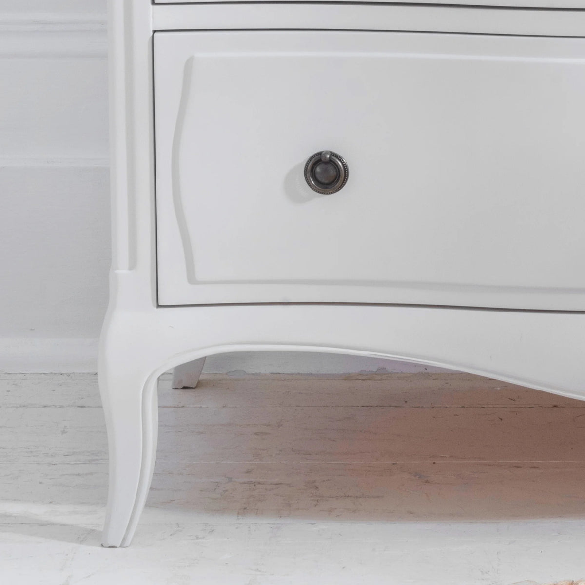 Amelie White Wooden 6-Drawer Chest – leg and lower drawer detail close-up