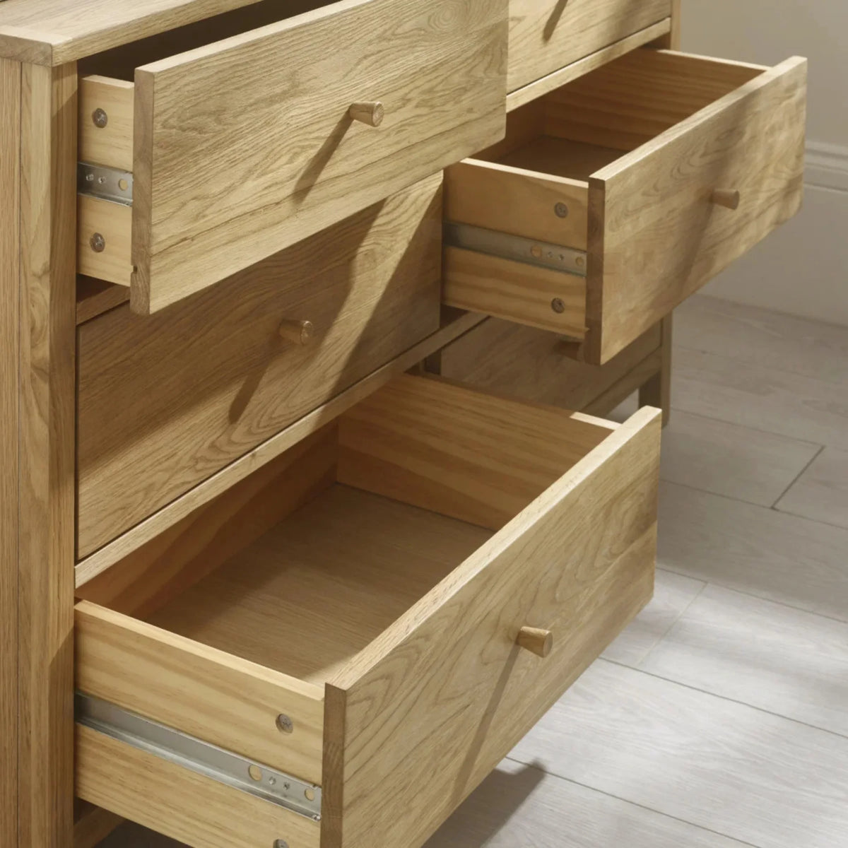Coxmoor Oak 6-Drawer Chest – side profile showing drawers open