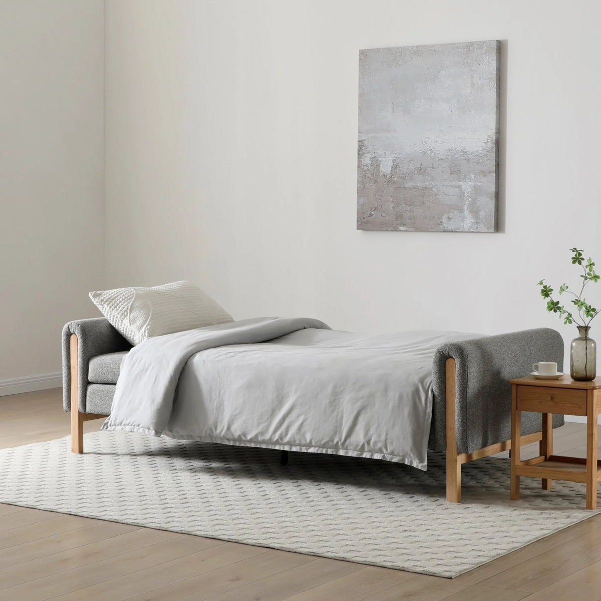 Thea Grey Upholstered Wood Sofa Bed – extended as a bed