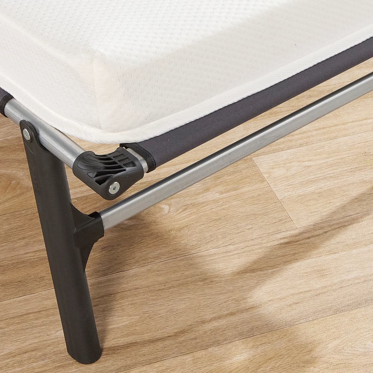 Rollaway Folding Bed with Memory Mattress – close-up of corner hinge and mattress