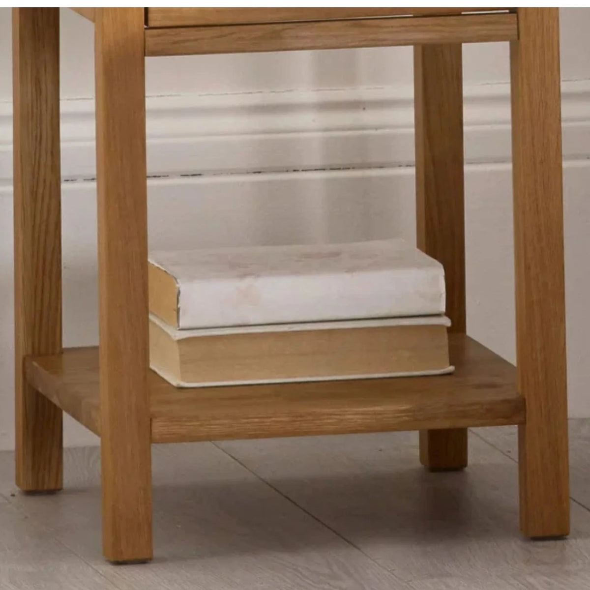 Coxmoor Oak 1-Drawer Bedside Table – side view showing legs 